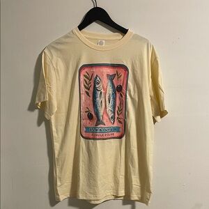 Amazon Cream T-Shirt with Pink Sardine Graphic